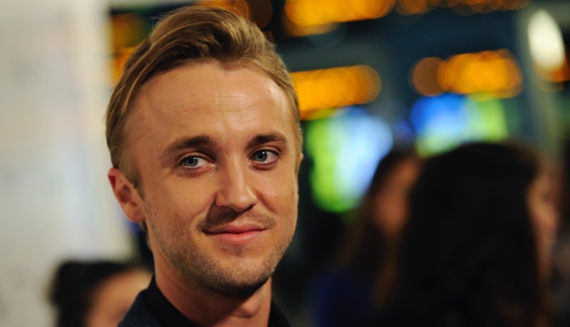 Tom Felton, a cast member in "In Secret," poses at the premiere of the film on Thursday, Feb. 6, 2014, in Los Angeles. (Photo by Chris Pizzello/Invision/AP)