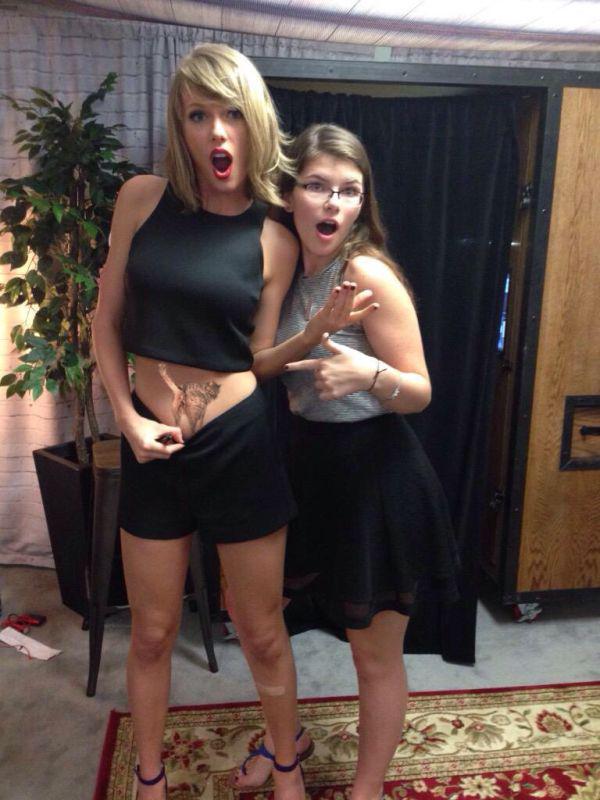 taylor-swift-flashes-her-stomach-the-internet-takes-over-25-photos-17